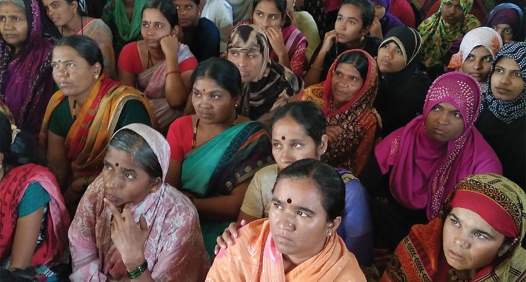 Women who have been empowered gather for a meeting in Ukkali village. 