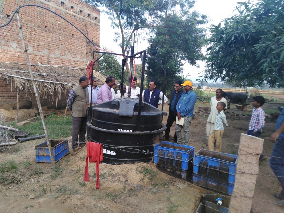 Officers of Agriculture department and project team interact with biogas farmer ©ICRISAT