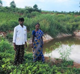 Farmers at their farm pond in the Kurnool watershed. Photo: ICRISAT Development Center